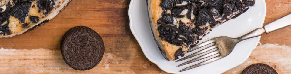 Overhead view of Oreo Cheesecake on a white plate